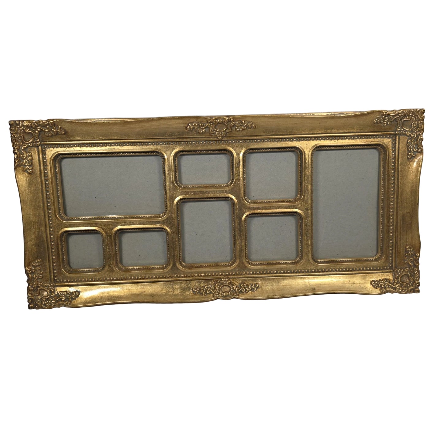 This is an ornate gold-colored resin collage picture frame