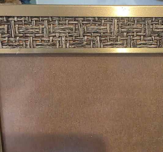Vintage-styled picture frame with a gold finish